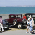 Art Deco cars parked along the Marine Oarade foreshore during Art Deco